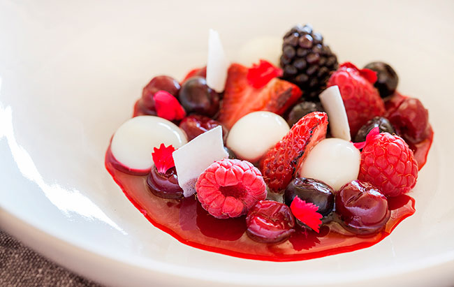 Cinco Jotas sautéed red fruits with multi-textured yogurt